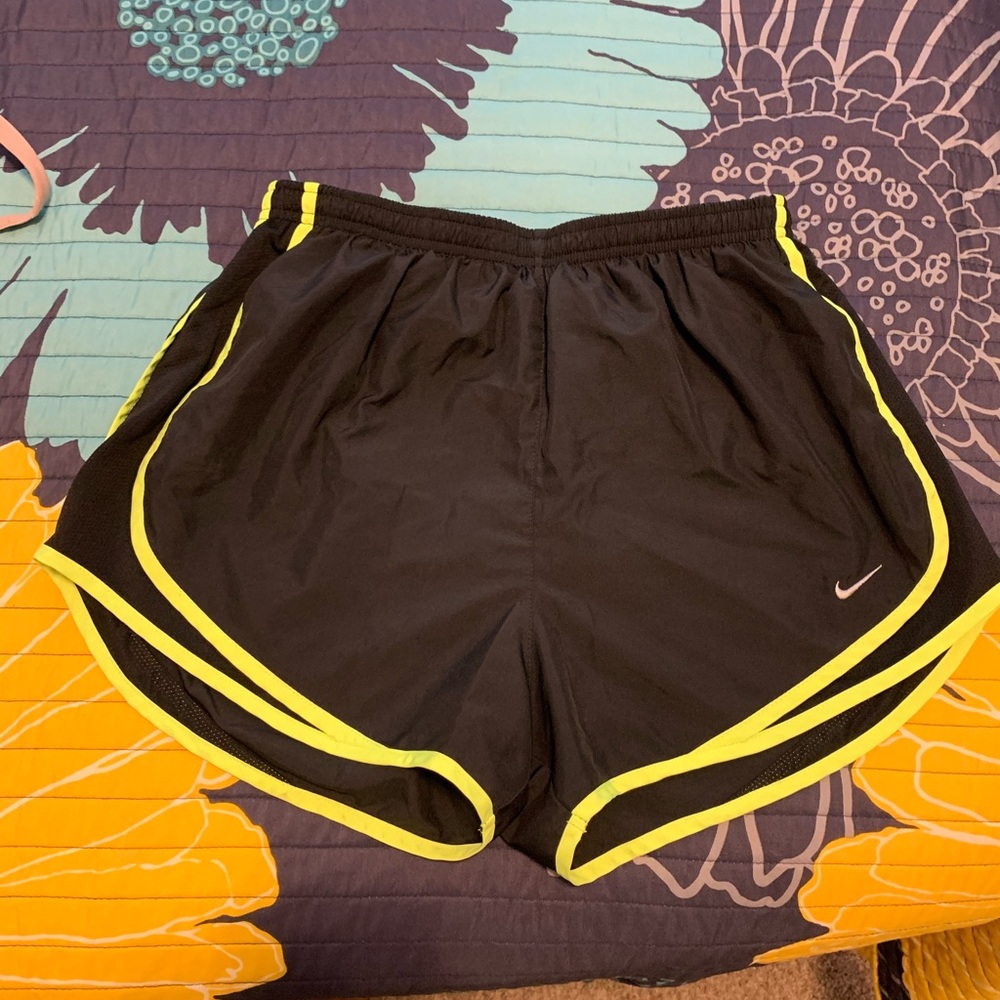 Black Nike running shorts
